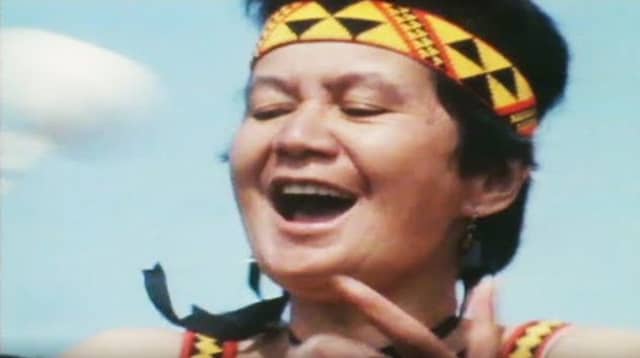 A member of the Pātea Māori Club performs in the music video for 'Poi E', co-directed by Waka Attewell and Paul Carvell.
